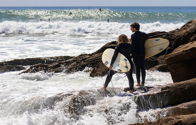 Beginneling? Boek je eerste surfles onder begeleiding