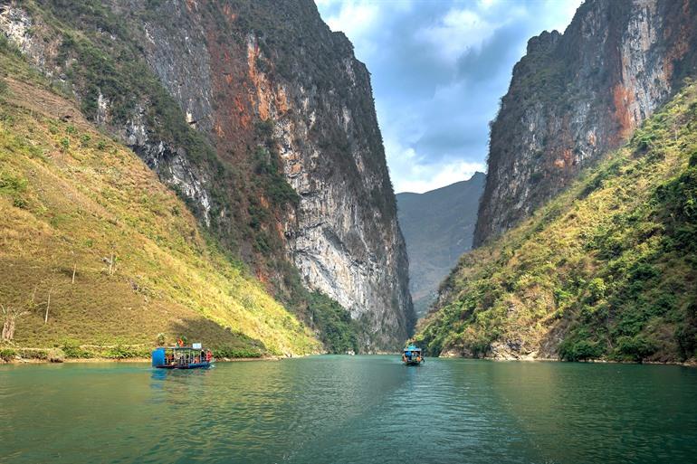 Boottocht op de Nho Que-rivier
