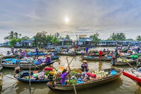 Ontdek de Mekong Delta in Vietnam: van boottochten langs drijvende markten tot kleine dorpen
