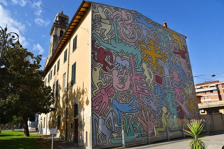 Muurschildering Keith Harring in Pisa