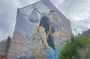 Muurschildering The Traveller, street-art Gent