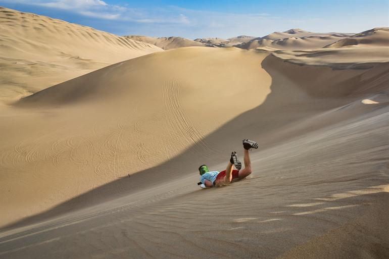 Sandboarden van de duinen in Huacachina